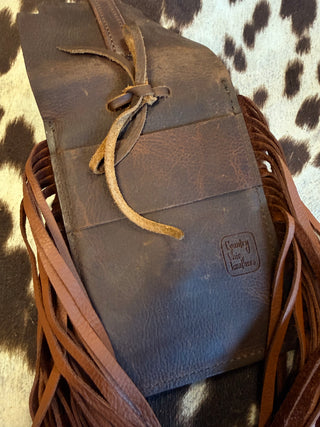 Back cinch saddle cell phone holder