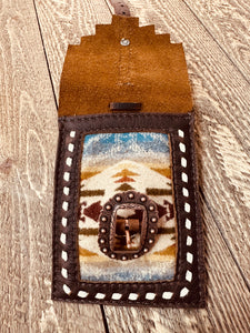 Back cinch saddle cell phone holder