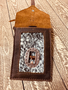 Back cinch saddle cell phone holder