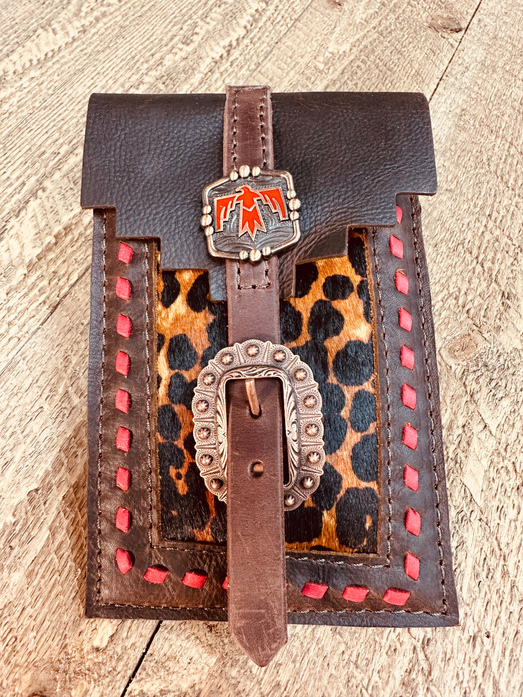 Back cinch saddle cell phone holder