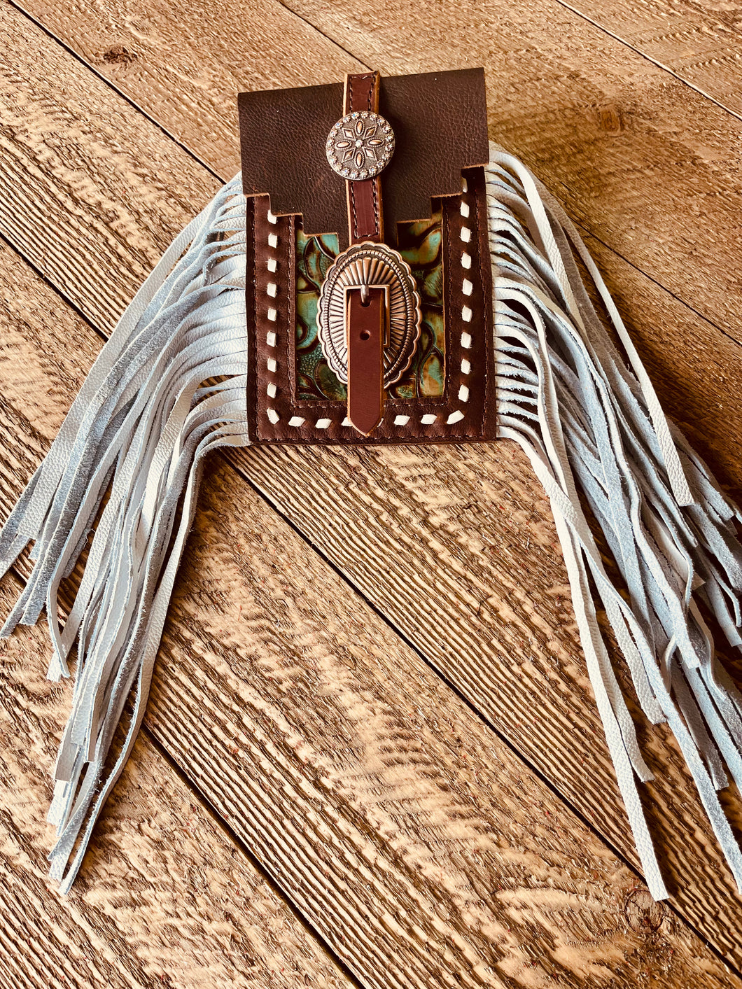 Back cinch saddle cell phone holder