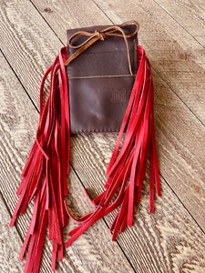 Back cinch saddle cell phone holder